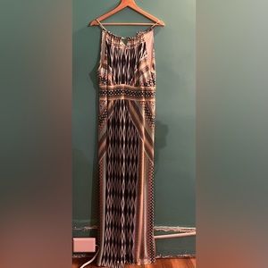 This chicos dress has a beautiful cut and patterns . Well made and durable .